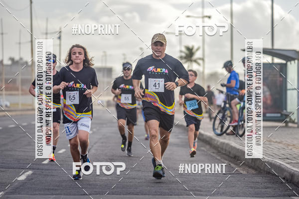 Achetez vos photos de l'vnementAURORA RUNNING sur Fotop