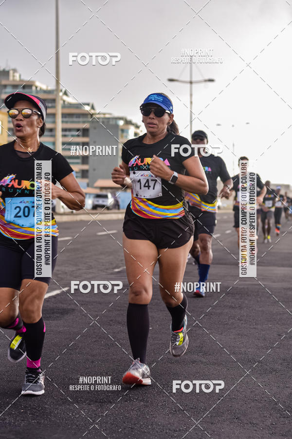 Achetez vos photos de l'vnementAURORA RUNNING sur Fotop