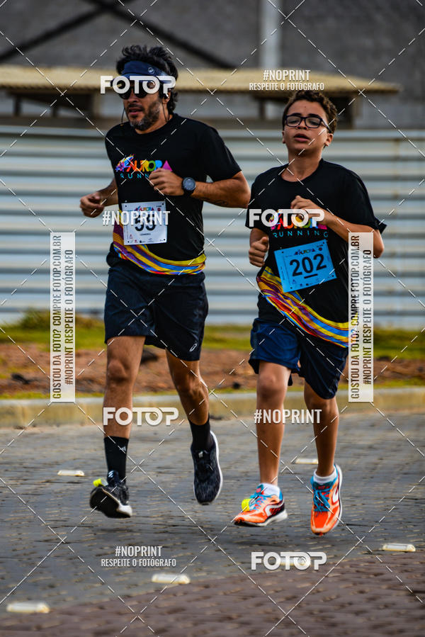 Achetez vos photos de l'vnementAURORA RUNNING sur Fotop