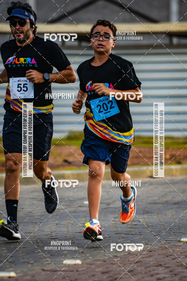 Achetez vos photos de l'vnementAURORA RUNNING sur Fotop