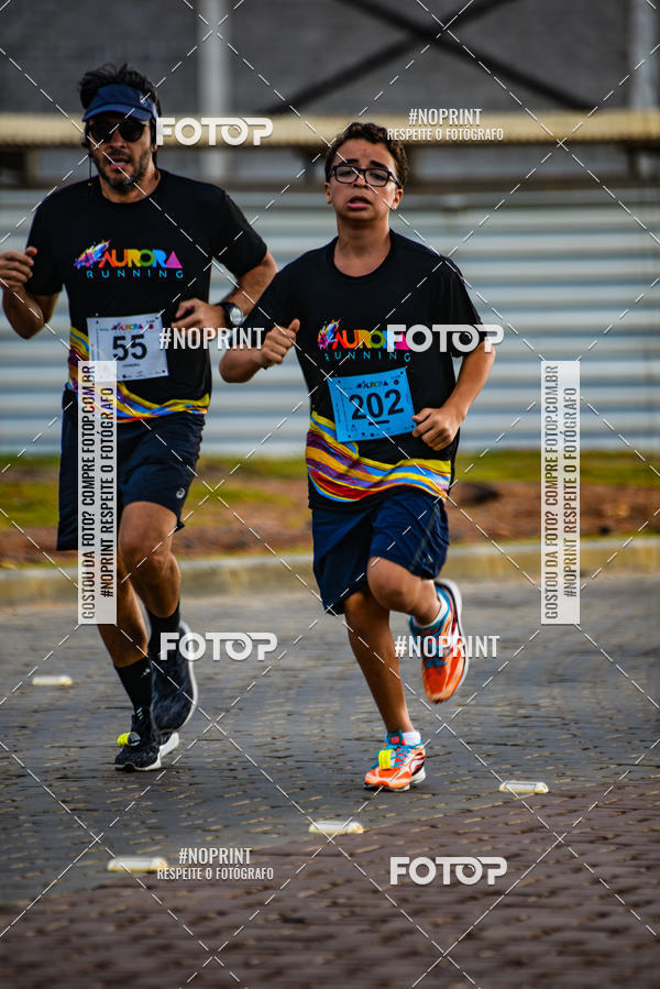 Achetez vos photos de l'vnementAURORA RUNNING sur Fotop