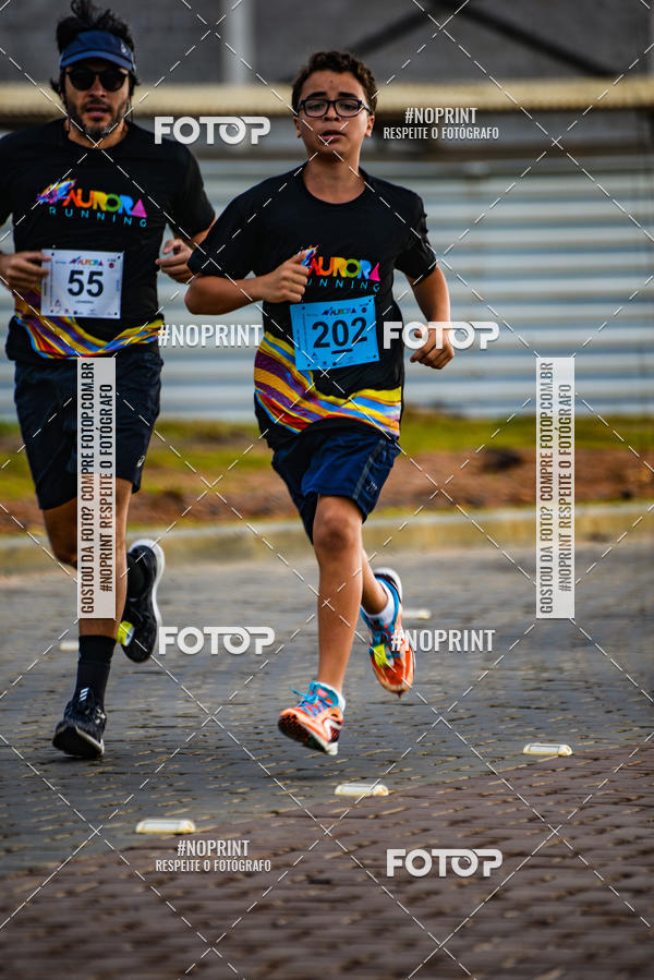 Achetez vos photos de l'vnementAURORA RUNNING sur Fotop