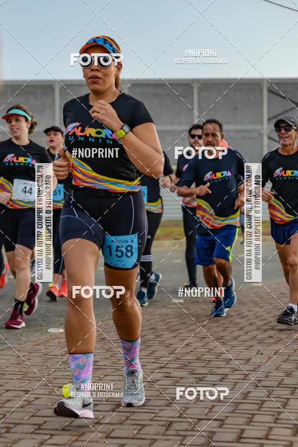 Achetez vos photos de l'vnementAURORA RUNNING sur Fotop