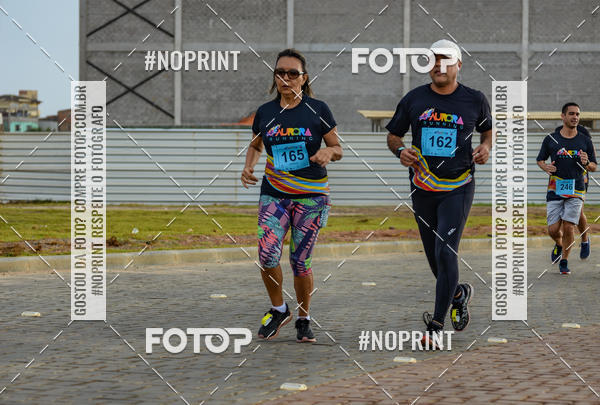 Achetez vos photos de l'vnementAURORA RUNNING sur Fotop