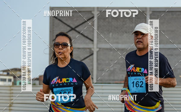 Achetez vos photos de l'vnementAURORA RUNNING sur Fotop