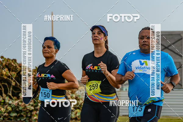 Achetez vos photos de l'vnementAURORA RUNNING sur Fotop