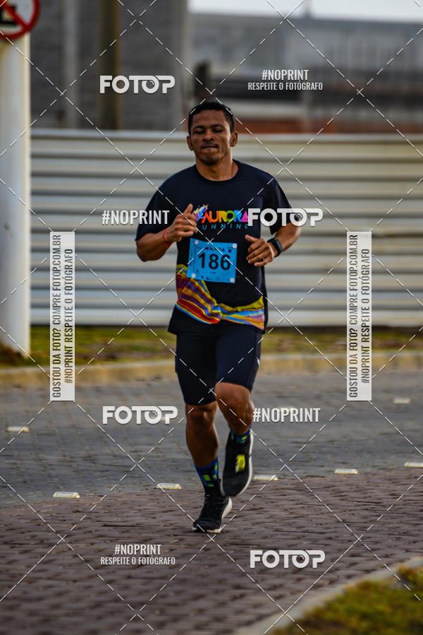 Achetez vos photos de l'vnementAURORA RUNNING sur Fotop