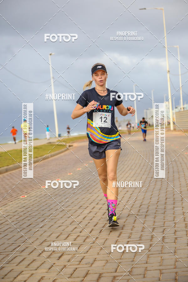 Achetez vos photos de l'vnementAURORA RUNNING sur Fotop