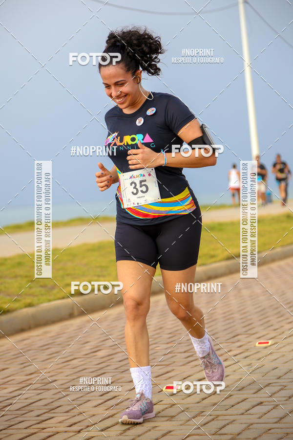 Achetez vos photos de l'vnementAURORA RUNNING sur Fotop