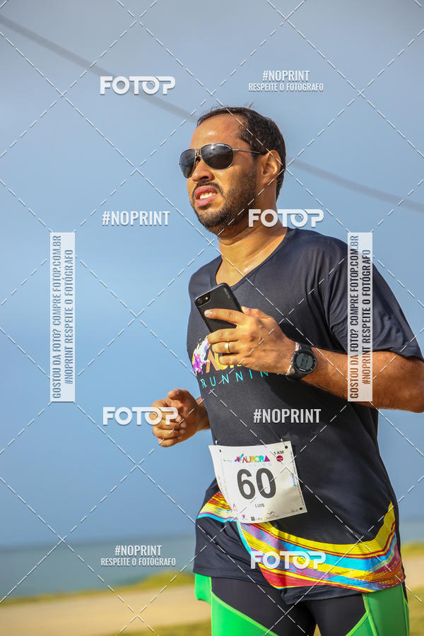 Achetez vos photos de l'vnementAURORA RUNNING sur Fotop