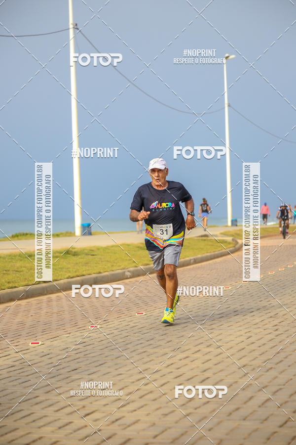 Achetez vos photos de l'vnementAURORA RUNNING sur Fotop