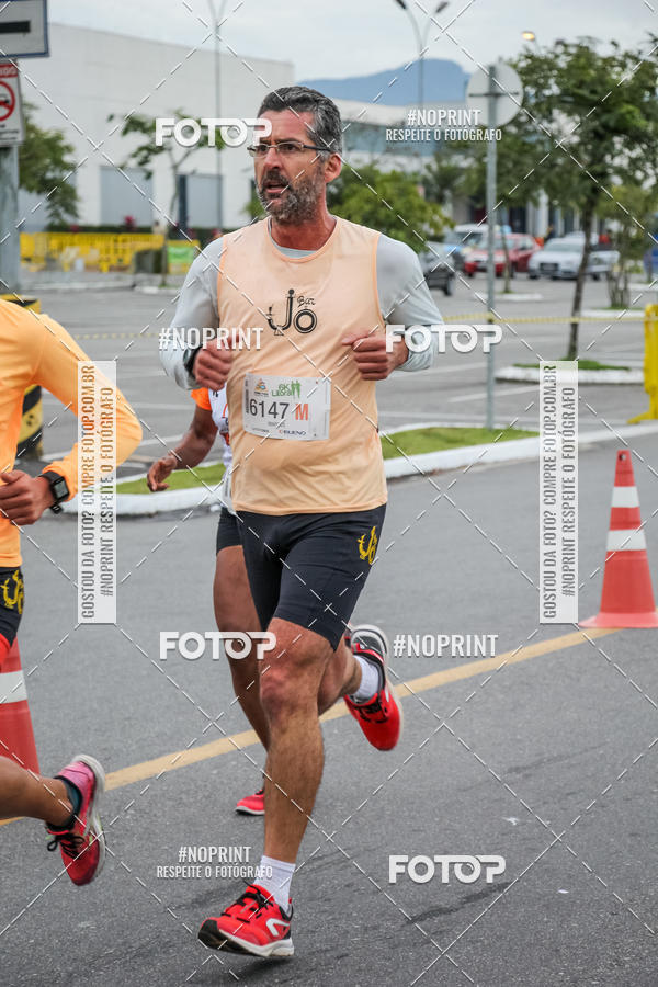 Buy your photos of the eventCorrida 6k Litoral & Co Veloz Dog Run on Fotop