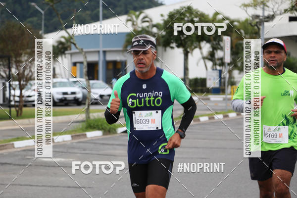 Buy your photos of the eventCorrida 6k Litoral & Co Veloz Dog Run on Fotop