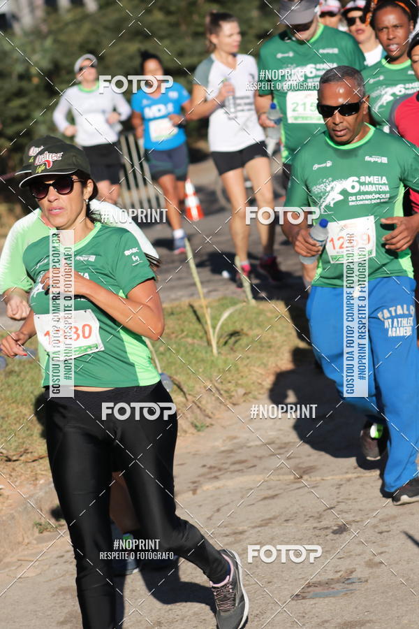 Buy your photos of the eventMeia Maratona de Divinpolis on Fotop