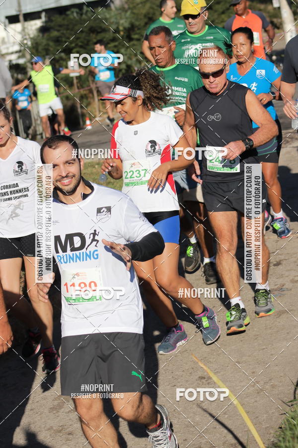 Buy your photos of the eventMeia Maratona de Divinpolis on Fotop