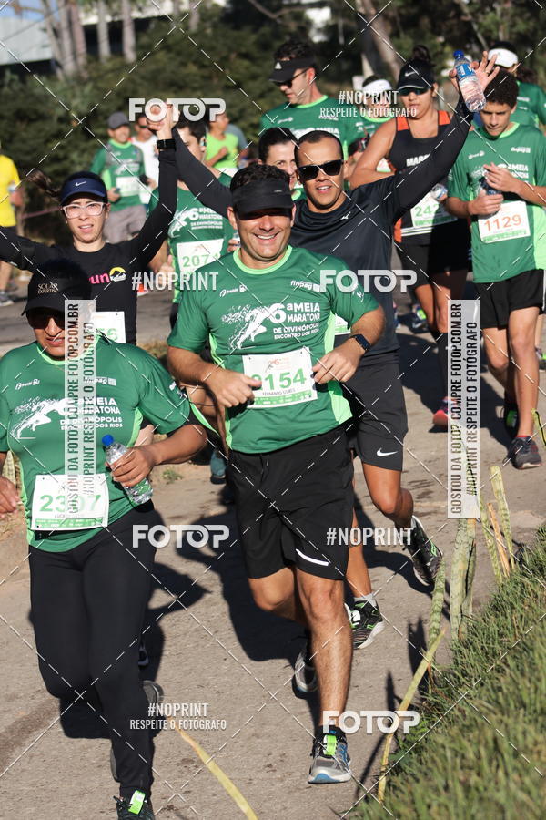 Buy your photos of the eventMeia Maratona de Divinpolis on Fotop