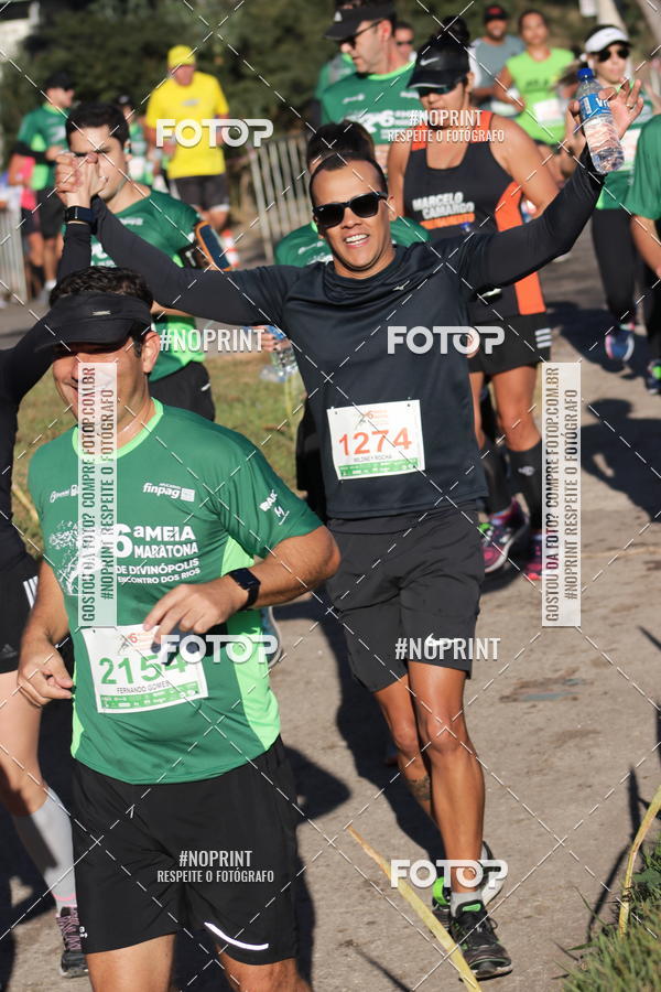 Buy your photos of the eventMeia Maratona de Divinpolis on Fotop