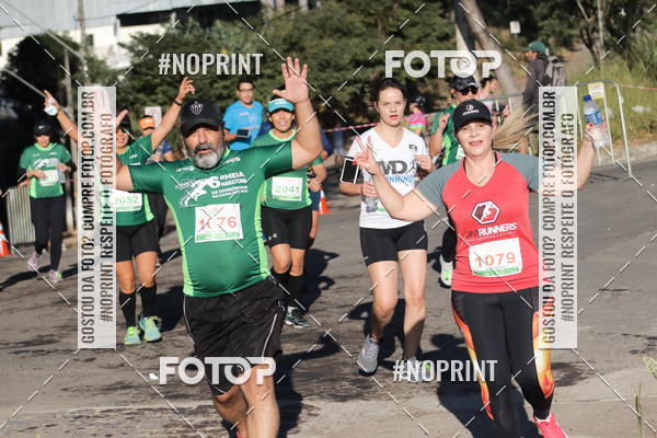 Buy your photos of the eventMeia Maratona de Divinpolis on Fotop