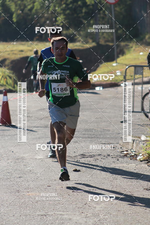 Buy your photos of the eventMeia Maratona de Divinpolis on Fotop