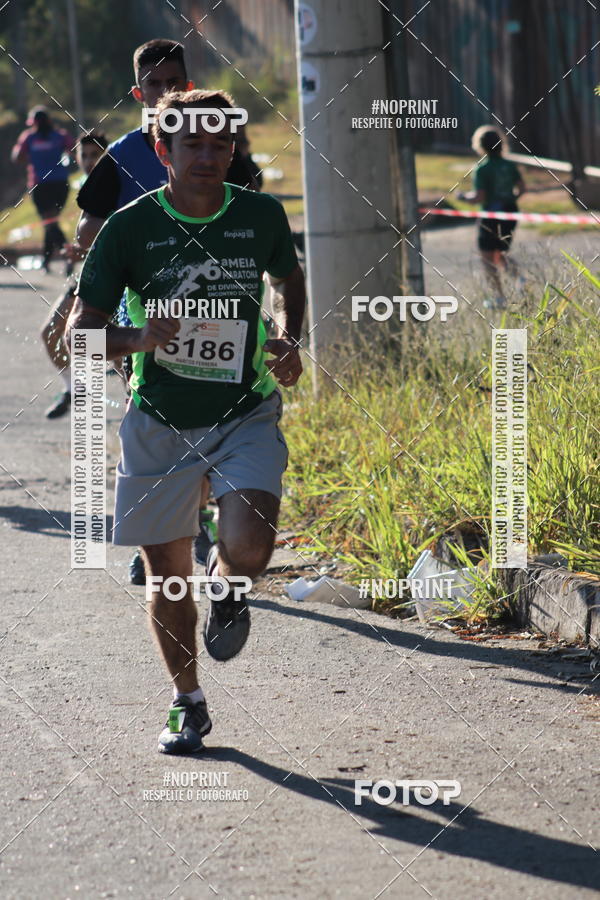 Buy your photos of the eventMeia Maratona de Divinpolis on Fotop