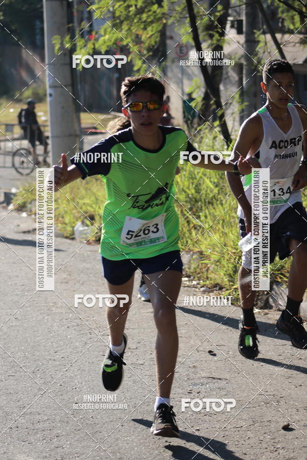 Buy your photos of the eventMeia Maratona de Divinpolis on Fotop