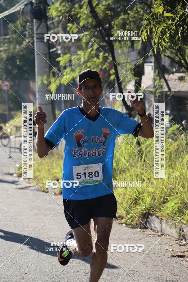 Buy your photos of the eventMeia Maratona de Divinpolis on Fotop