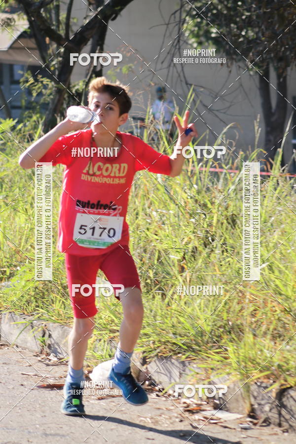 Buy your photos of the eventMeia Maratona de Divinpolis on Fotop