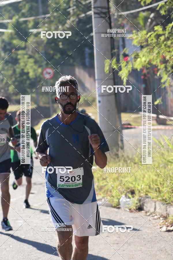 Buy your photos of the eventMeia Maratona de Divinpolis on Fotop