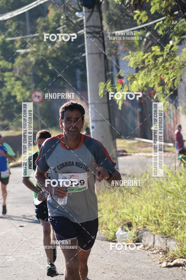 Buy your photos of the eventMeia Maratona de Divinpolis on Fotop