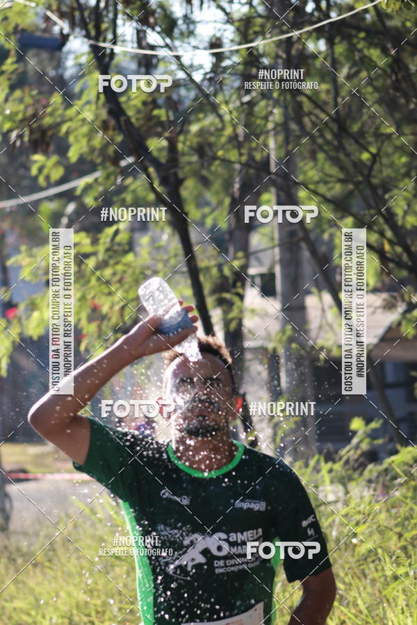 Buy your photos of the eventMeia Maratona de Divinpolis on Fotop