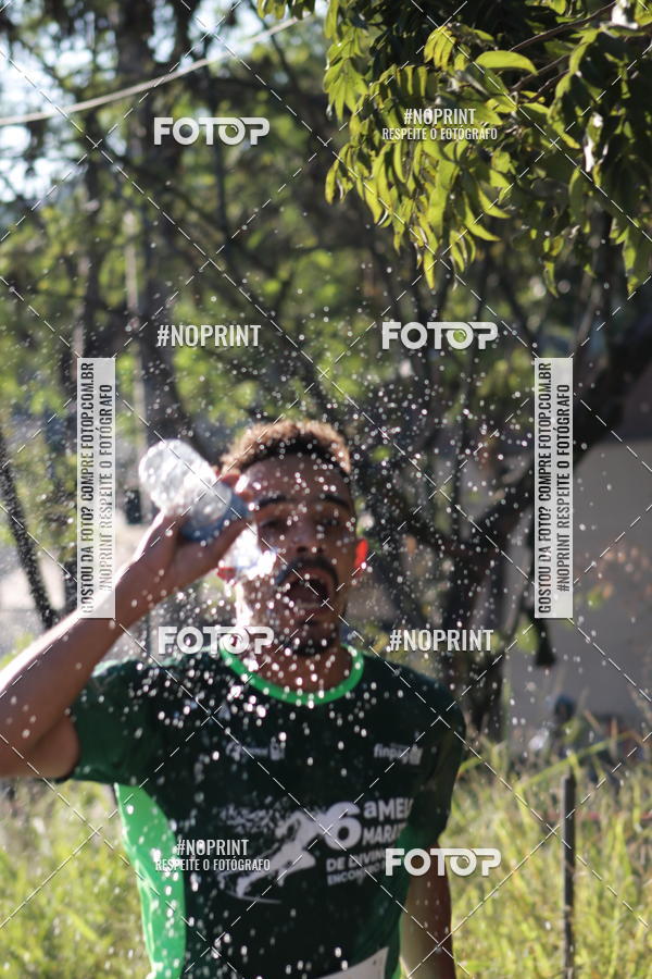 Buy your photos of the eventMeia Maratona de Divinpolis on Fotop