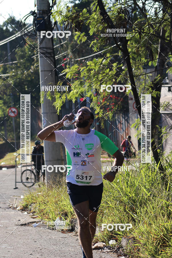 Buy your photos of the eventMeia Maratona de Divin�polis on Fotop