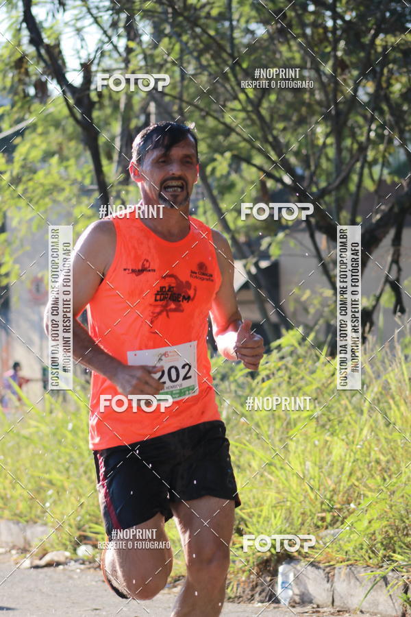 Buy your photos of the eventMeia Maratona de Divinpolis on Fotop