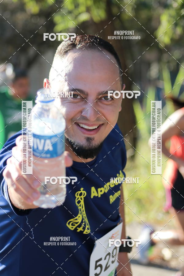 Buy your photos of the eventMeia Maratona de Divinpolis on Fotop