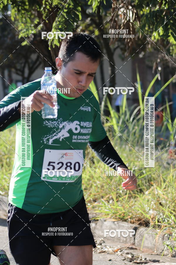 Buy your photos of the eventMeia Maratona de Divinpolis on Fotop