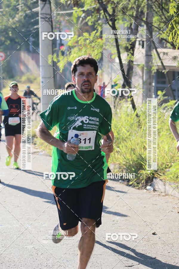 Buy your photos of the eventMeia Maratona de Divinpolis on Fotop