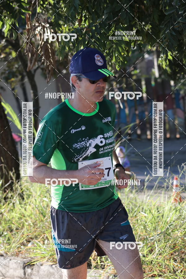 Buy your photos of the eventMeia Maratona de Divinpolis on Fotop