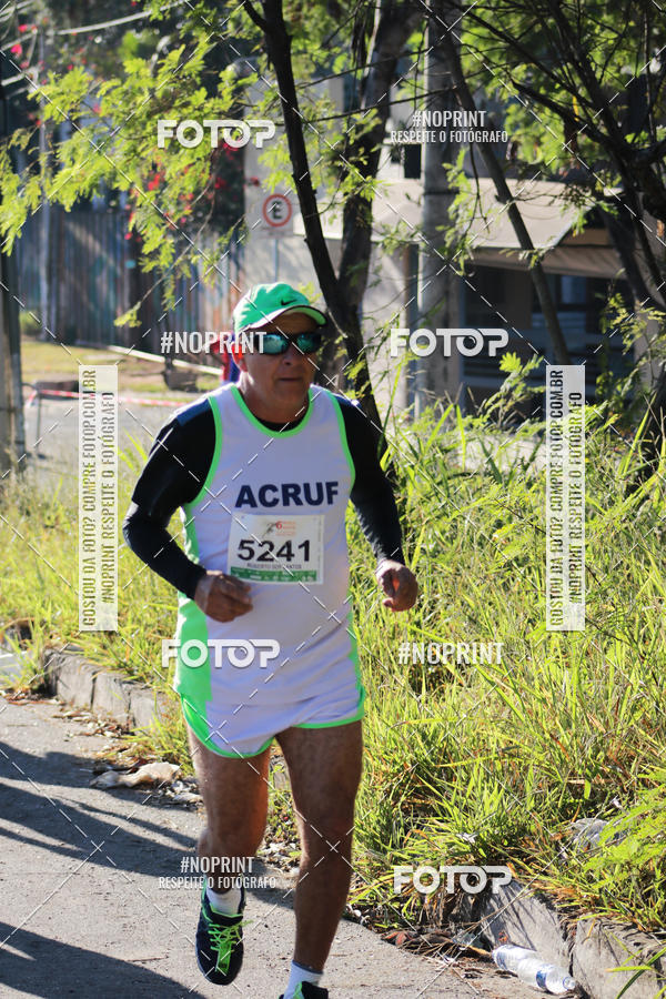 Buy your photos of the eventMeia Maratona de Divin�polis on Fotop