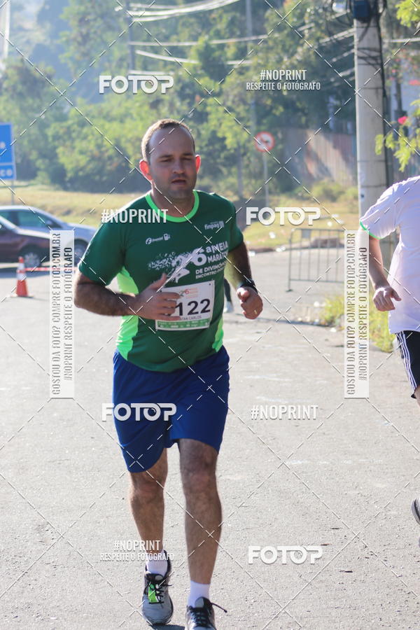Buy your photos of the eventMeia Maratona de Divinpolis on Fotop
