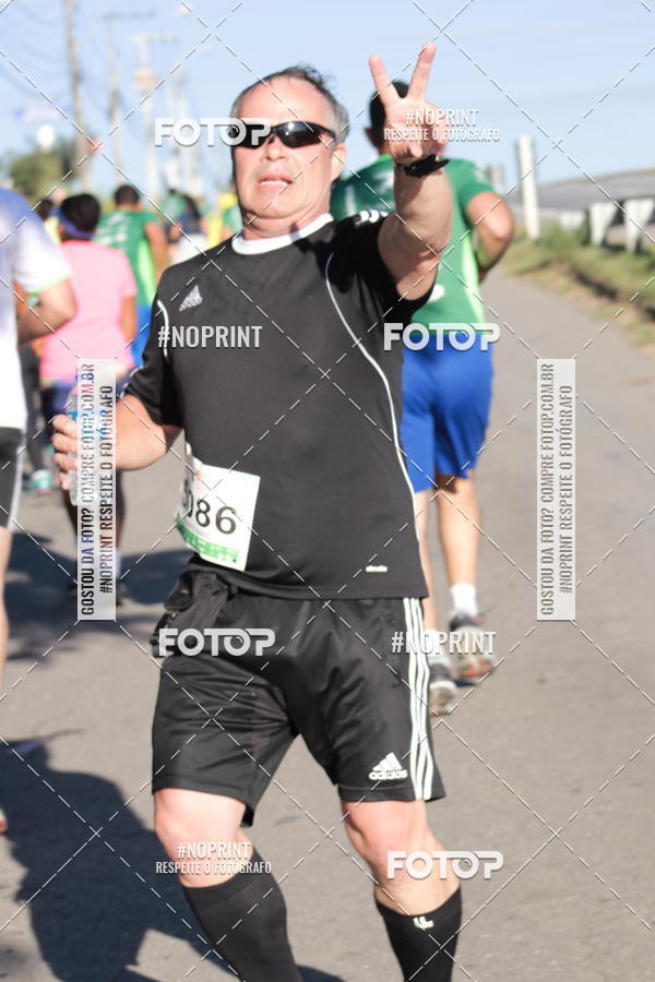 Buy your photos of the eventMeia Maratona de Divinpolis on Fotop