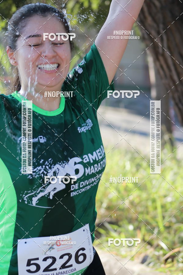 Buy your photos of the eventMeia Maratona de Divinpolis on Fotop