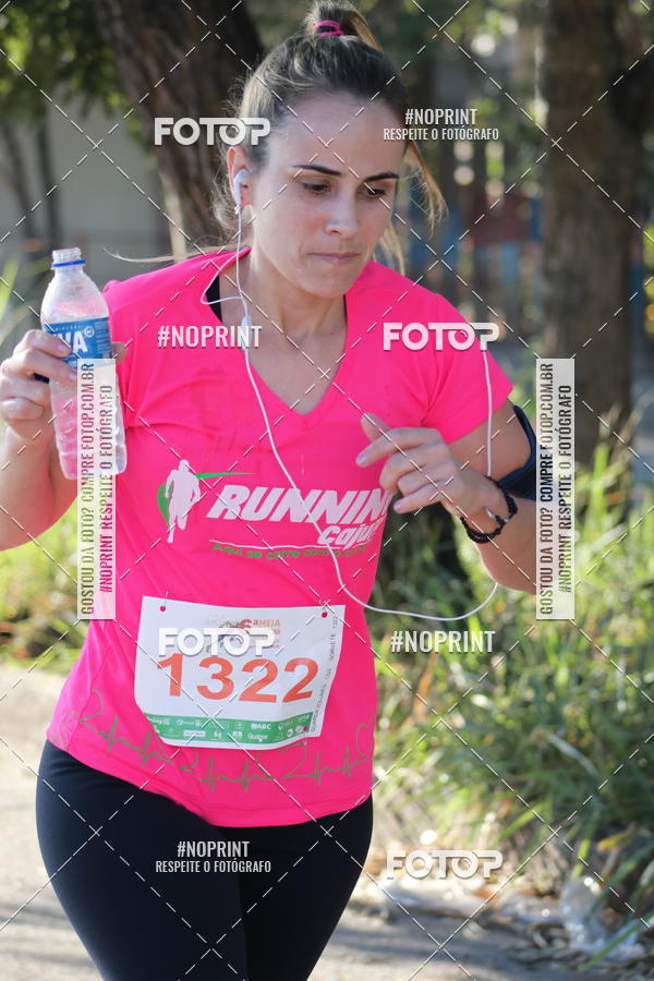 Buy your photos of the eventMeia Maratona de Divinpolis on Fotop
