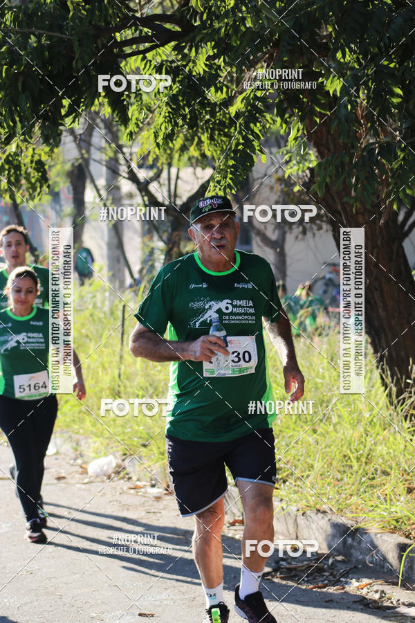 Buy your photos of the eventMeia Maratona de Divin�polis on Fotop