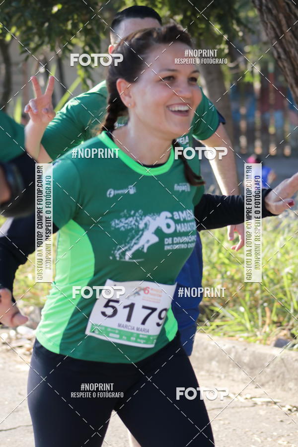 Buy your photos of the eventMeia Maratona de Divinpolis on Fotop