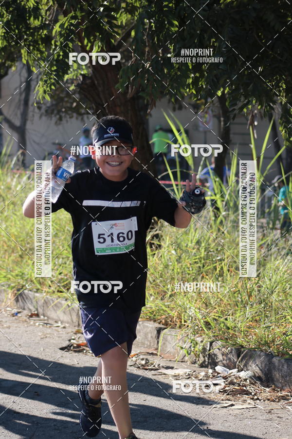 Buy your photos of the eventMeia Maratona de Divinpolis on Fotop