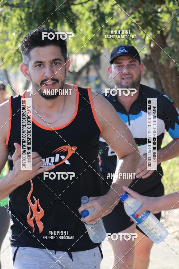Buy your photos of the eventMeia Maratona de Divinpolis on Fotop