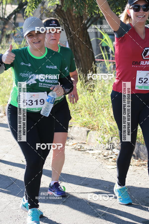 Buy your photos of the eventMeia Maratona de Divinpolis on Fotop