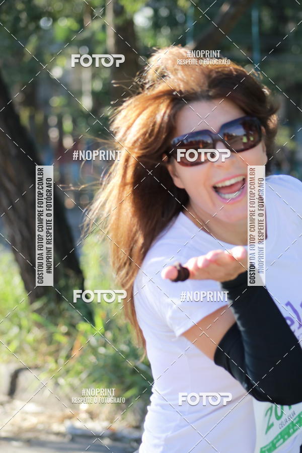 Buy your photos of the eventMeia Maratona de Divinpolis on Fotop