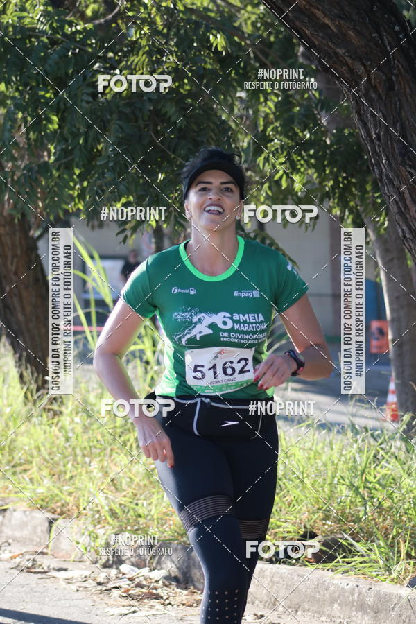 Buy your photos of the eventMeia Maratona de Divinpolis on Fotop