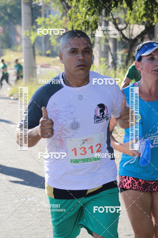 Buy your photos of the eventMeia Maratona de Divinpolis on Fotop